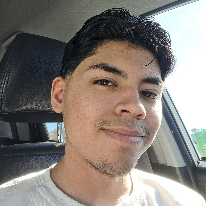 Richard smiling after a haircut